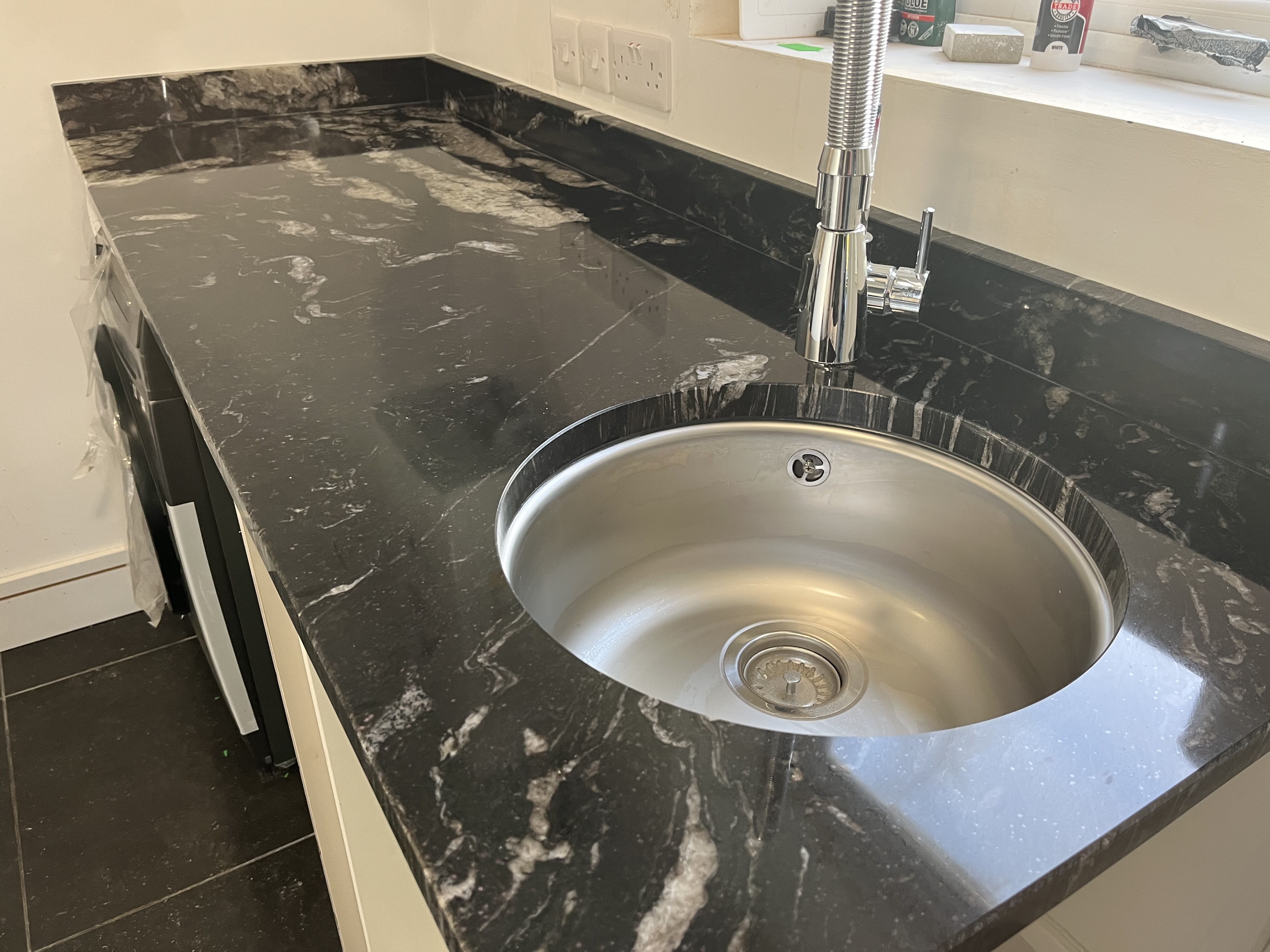 Natural Black granite Utility worktop with under mounted Sink.