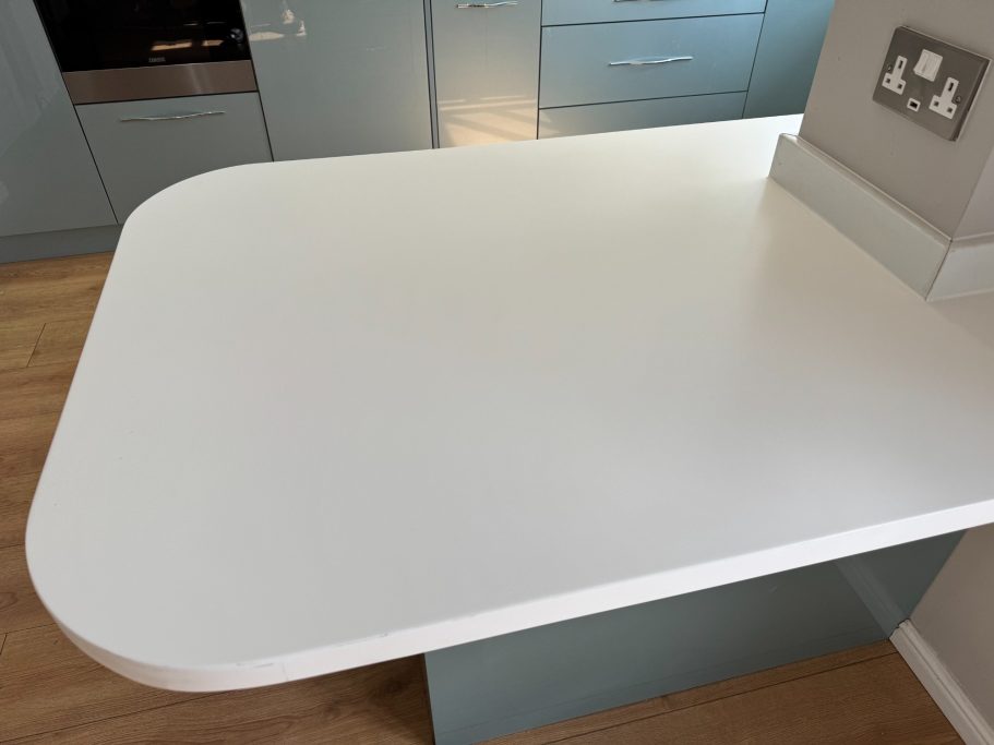 After restoration: polished Corian surface Corian surface after sanding and refinishing.