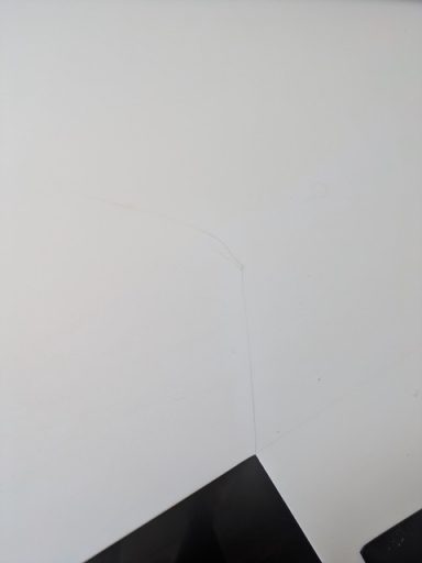 White corian cracked at the front corner Cracked corian kitchen worktop in the corner this was caused because the worktop was not supported underneath properly