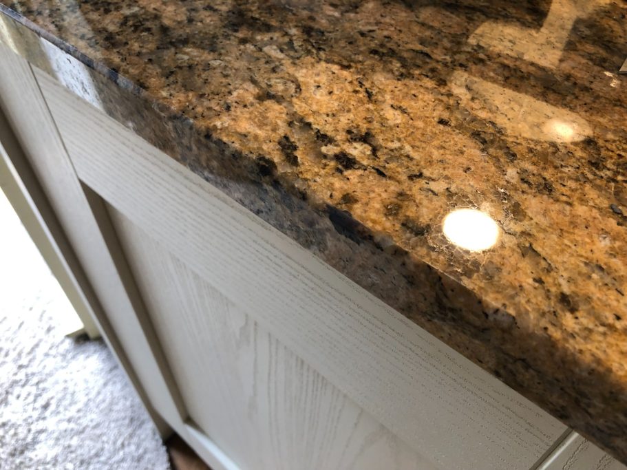 Polished New Venetian Gold granite High gloss granite worktop.
