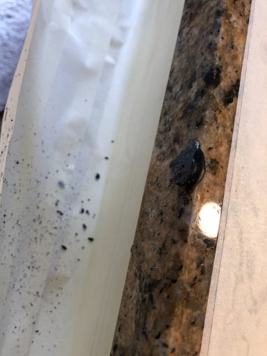 Granite damaged on the edge, needs refilling and restoring to its origanal finish. Worktop was repaired in halifax.