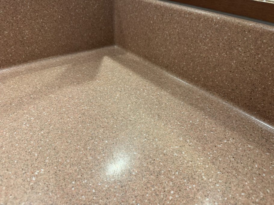 Cream Corian worktop surface Cream Corian worktop surface.