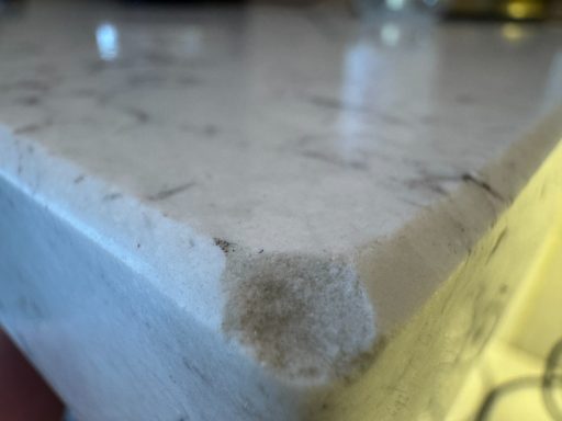 Chipped worktop corner with piece completely missing Damaged worktop on the corner the customer did not have the Chip. We had to completely make a new corner to put in the missing piece.