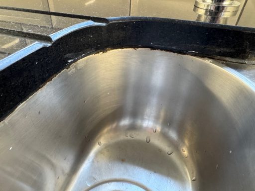 Silicone sealer all black and perished. Worktop repair in Emley, Huddersfield.