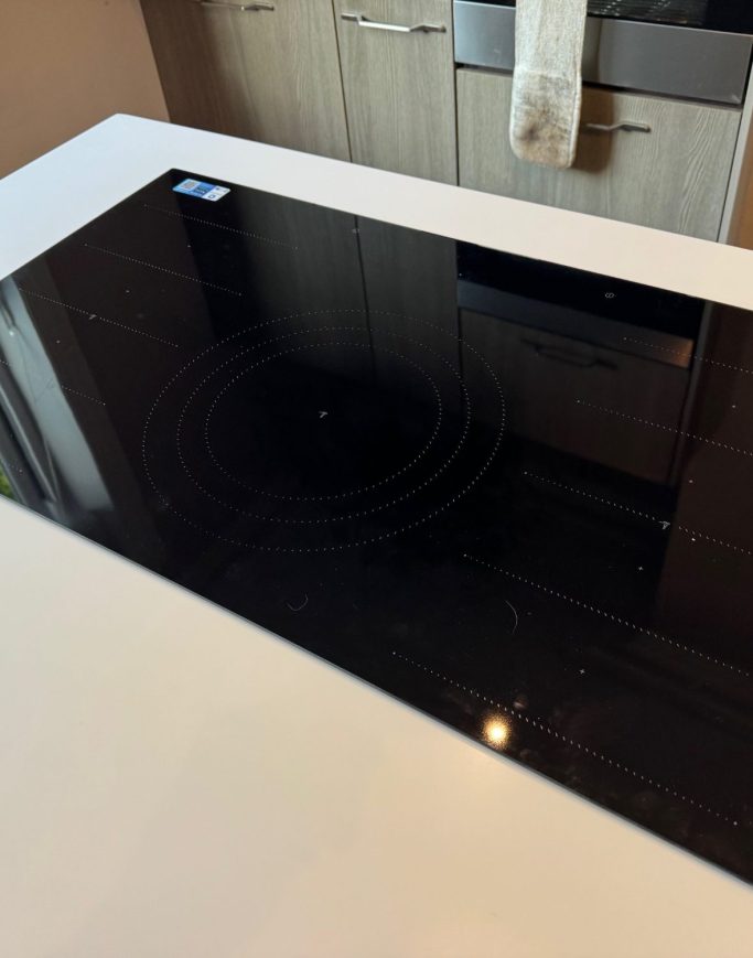 Corian worktop had to be fabricated on site as the new hob was bigger. Cutting on site was the only option. The new hob fitted perfectly.