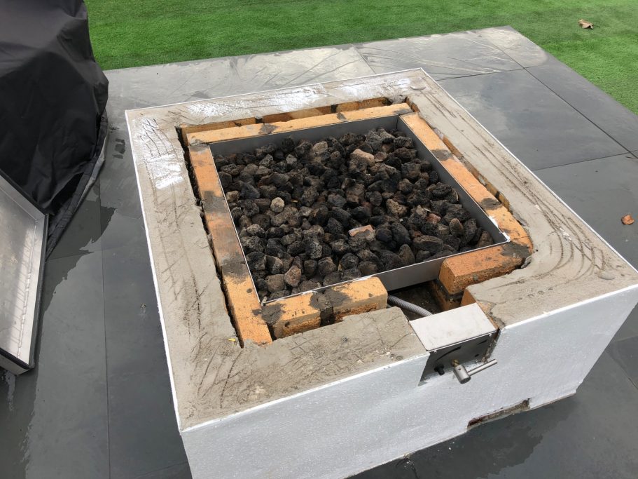 Outdoor fire-pit base before fitting the top Outdoor concrete fire-pit base before fitting the granite top.