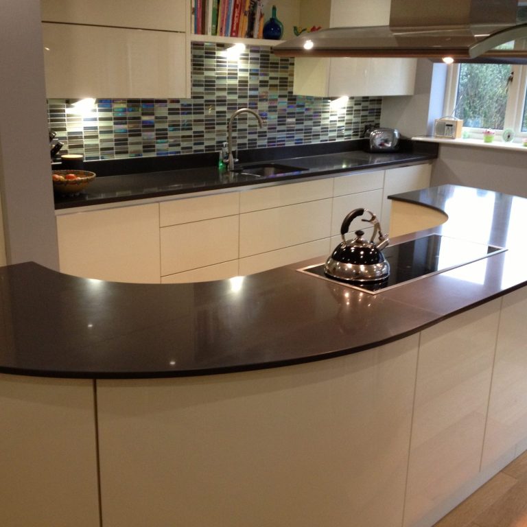 Brown Quartz curved shaped island bar polished all the way around - job fitted in Ripon North Yorkshire.