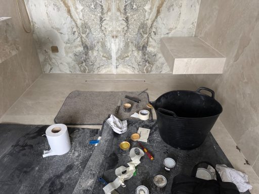 This is a picture of some materials needed to repair the marble, coloured resin, and diamond pads. Fillers and diamond pads were used to repair the Crack to the marble the bottom of the panel..