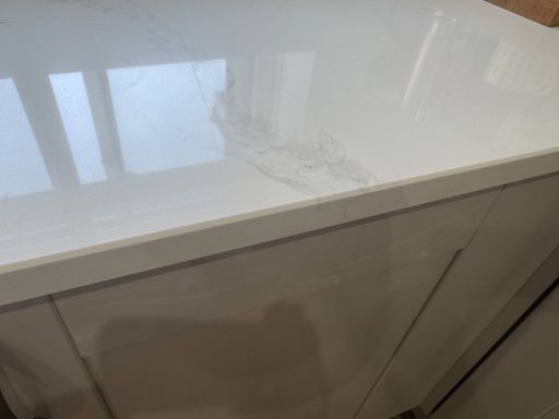 Fully repaired marble worked up in Harrogate, Leeds Quartz marble effect kitchen worktop fully installed at the edge and the surface which was chipped