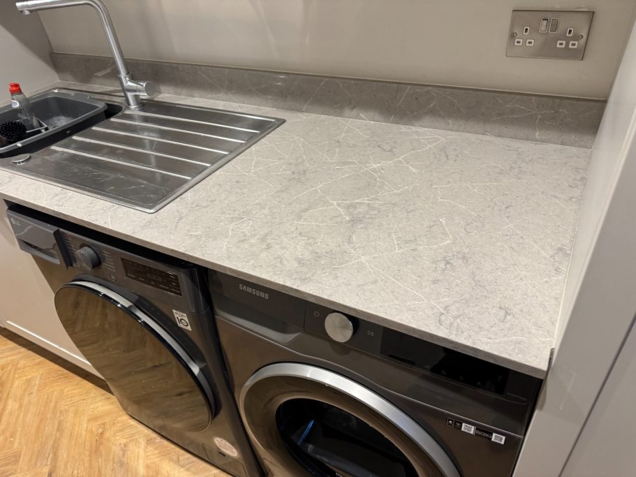 After restoration: repolished quartz surface Repaired quartz worktop in the kitchen utility. Surface repolished to bring up the gloss finish. worktop repair in huddersfield.