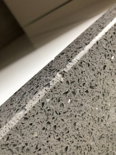 Damaged grey quartz repair