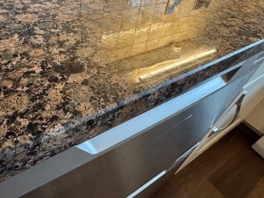 Fully repaired granny works up in Huddersfield. Natural Brown granite repaired on the surface and polished on the edge.