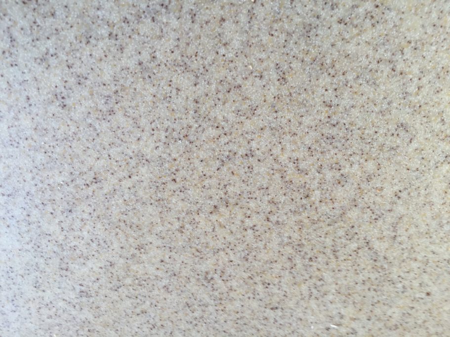 Fully restored corian worktop it's natural state This picture shows the worktop magnified at the damaged area. This was filled and sanded to match the rest of the existing shine.