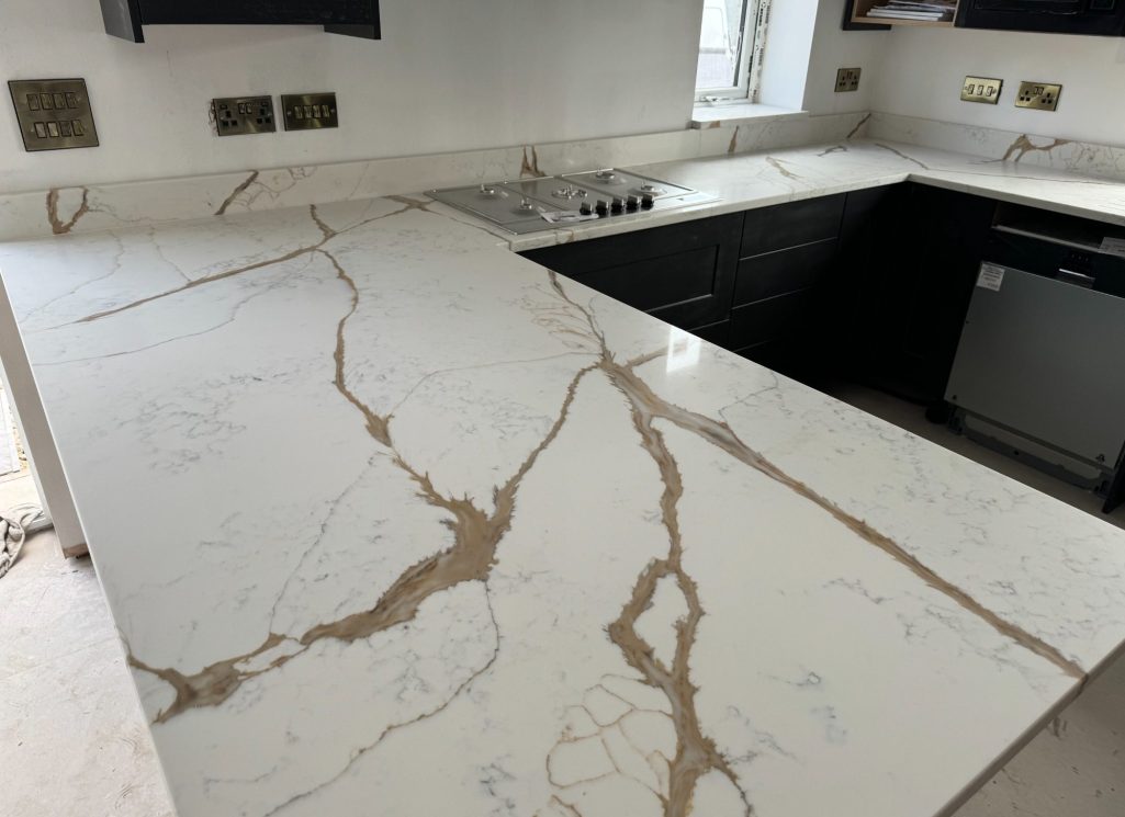 Callacata quartz breakfast bar fitted in harrogate leeds.Matching veins at joints 