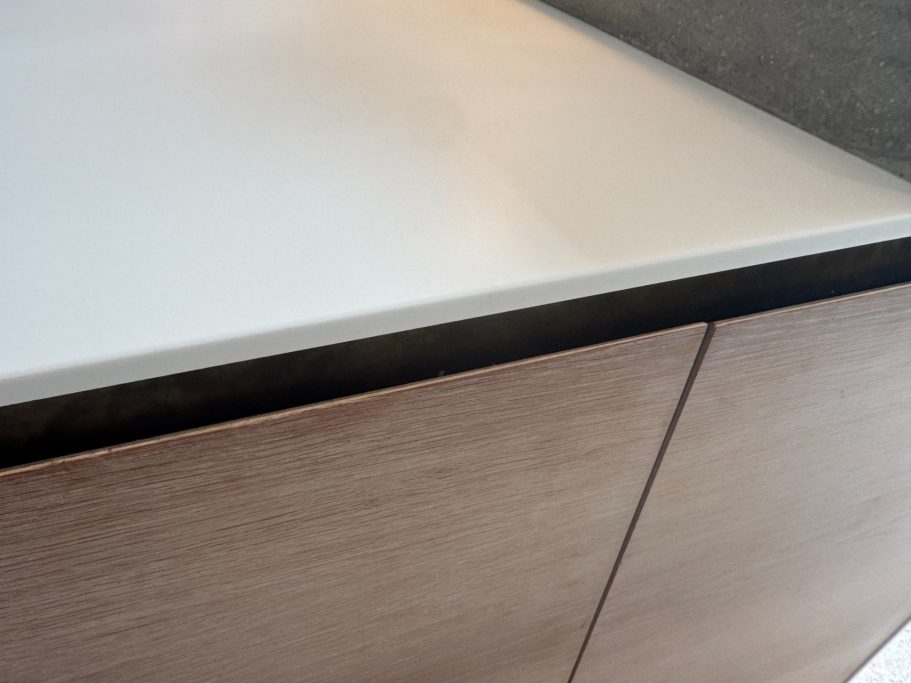 After repair: restored Corian edge corian worktop fully repaired with the large Chip filled with the same material to match the existing colour