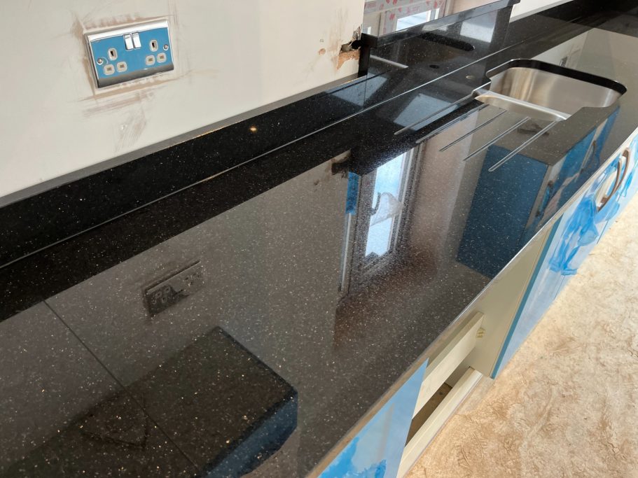 After restoration: polished black granite Polished granite worktop